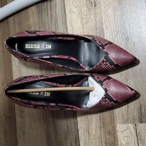 Winnie Harlow Pink and Black Heels